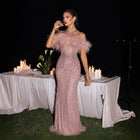 Glamorous Blush Pink Halter Neck Evening Dress with Feather Trim and All-Over Beading SS124