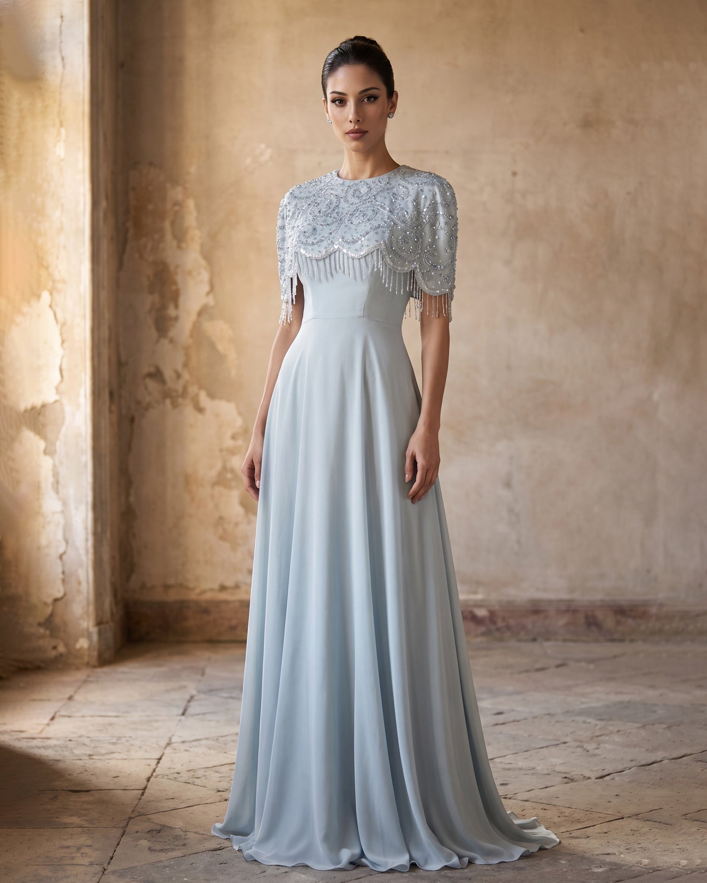 Blue A-line floor-length evening dress with beaded cape and tassel fringe