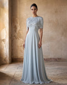 Blue A-line floor-length evening dress with beaded cape and tassel fringe